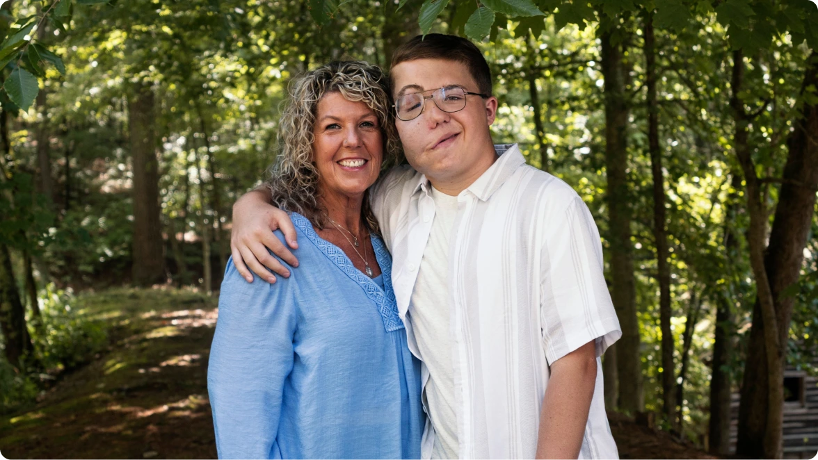 Quentin, age 18, living with NF1 PN, shown with his mom. Quentin is currently taking Koselugo.