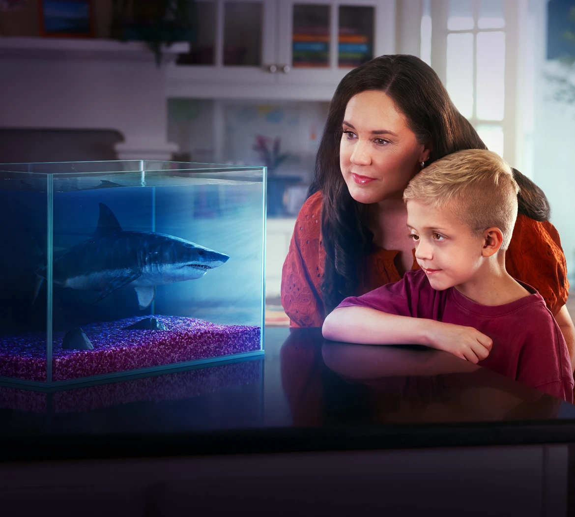 Caleb, age 9, living with NF1 PN, shown with his mom. Caleb is currently taking Koselugo.