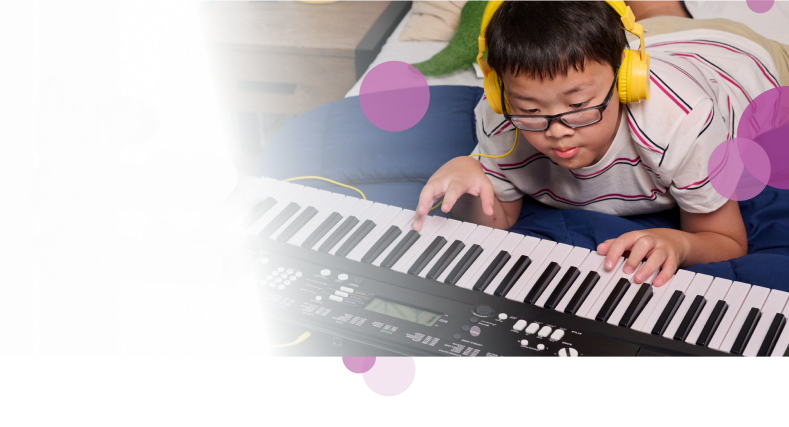 Sam, a 10-year-old who takes Koselugo for  NF1 PN, playing the keyboard