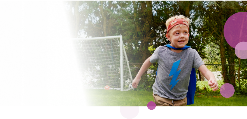 Caleb, a 7-year-old living with NF1 PN, playing in a park